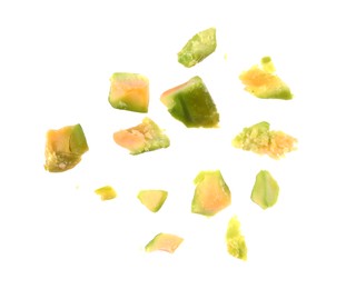 Photo of Pieces of peeled pistachio nut isolated on white