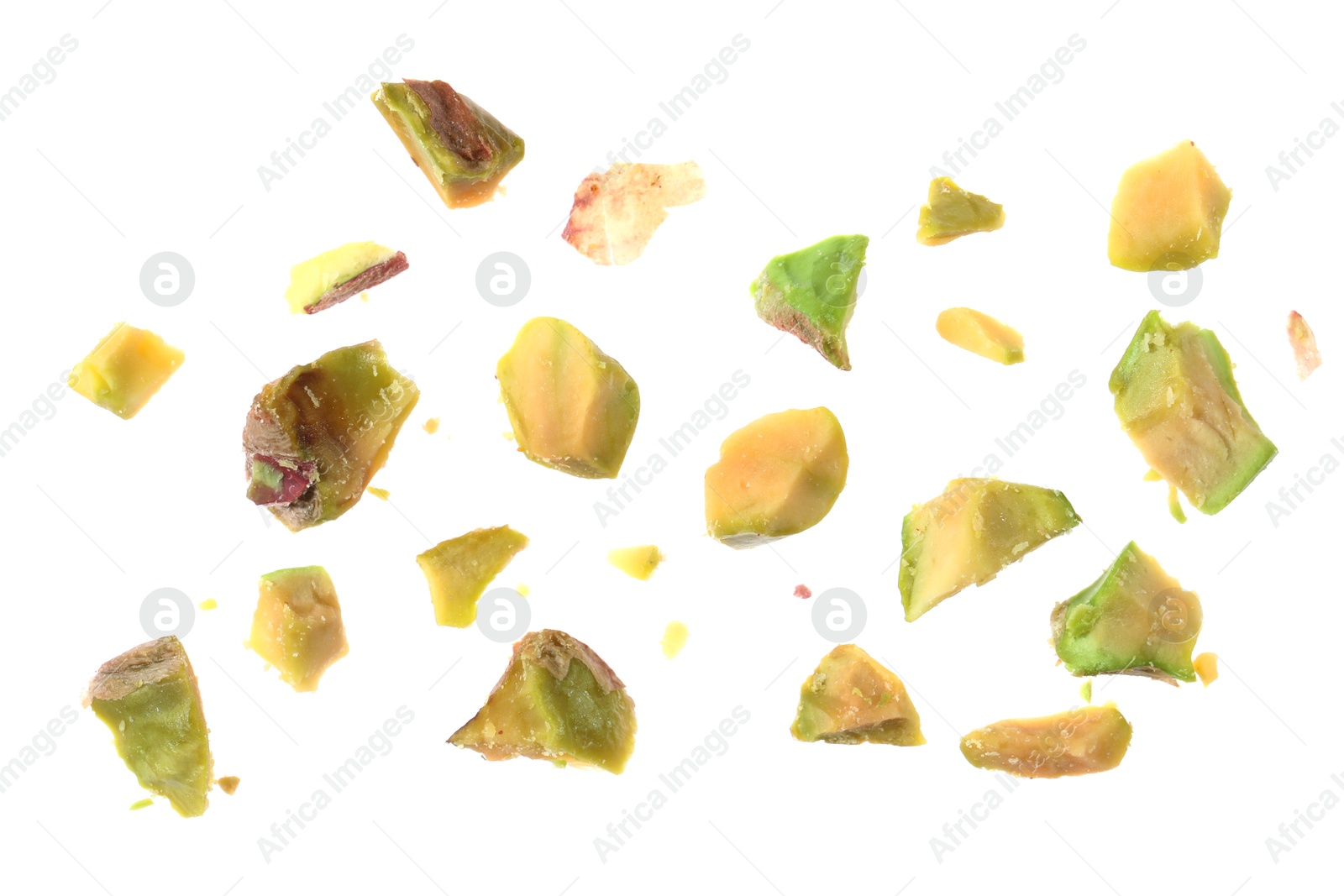 Photo of Pieces of peeled pistachio nut isolated on white