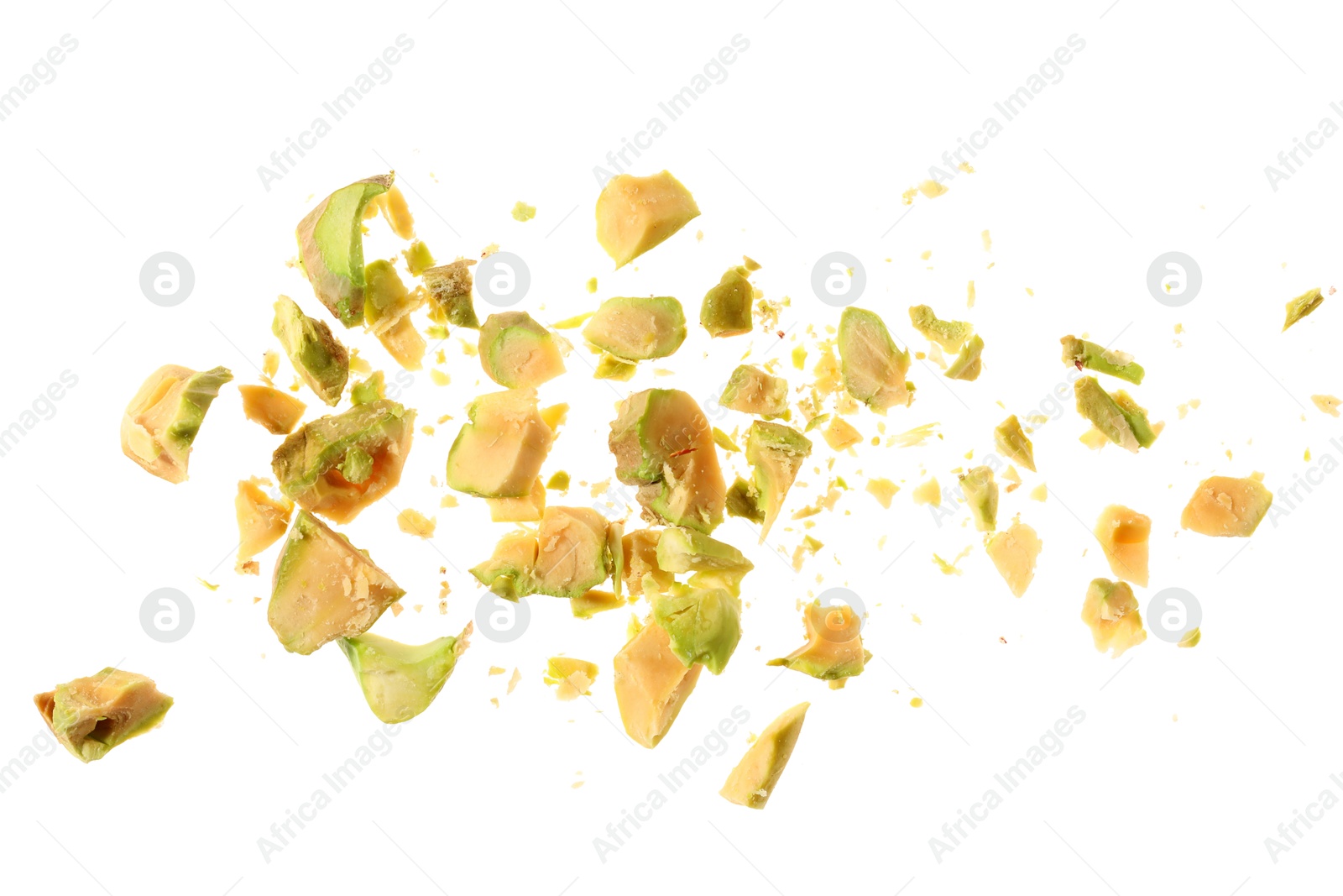 Photo of Pieces of peeled pistachio nut isolated on white