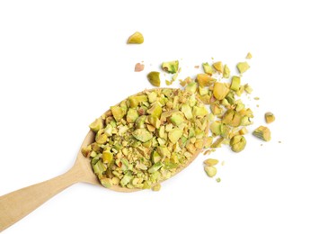 Photo of Pieces of peeled pistachio nut in wooden spoon isolated on white, top view