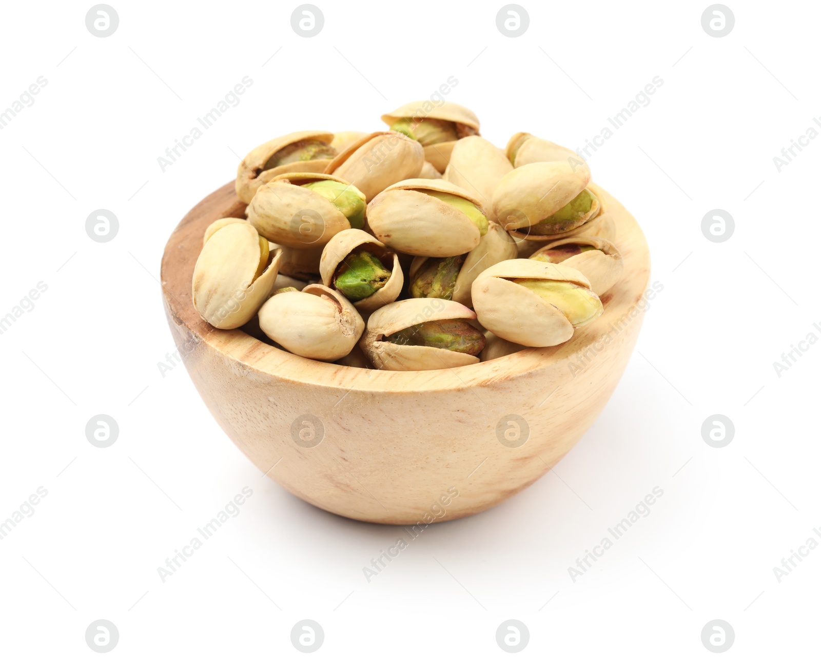 Photo of Tasty pistachio nuts in bowl isolated on white