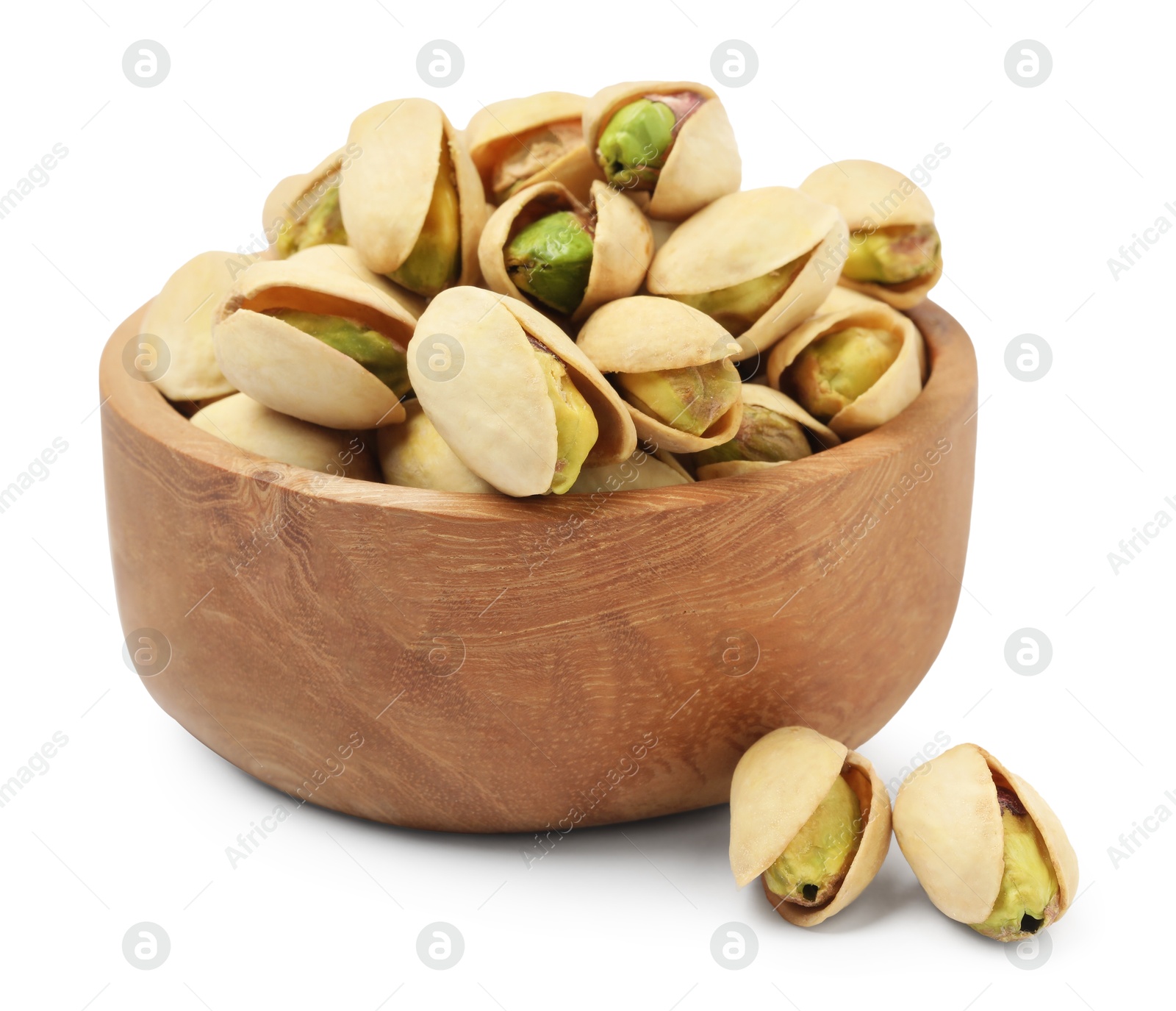 Photo of Tasty pistachio nuts in bowl isolated on white