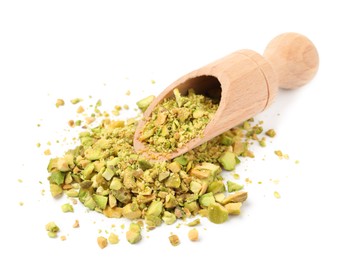 Photo of Pieces of peeled pistachio nut in wooden scoop isolated on white