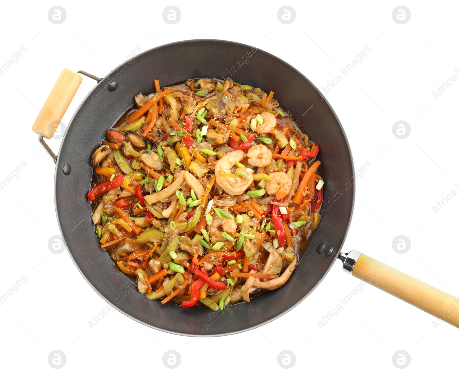 Photo of Stir-fry sea food in wok isolated on white, top view