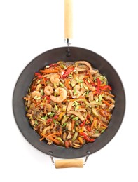 Photo of Stir-fry sea food in wok isolated on white, top view