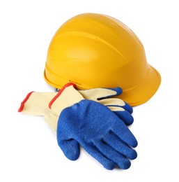 Photo of Yellow hard hat and gloves isolated on white. Safety equipment