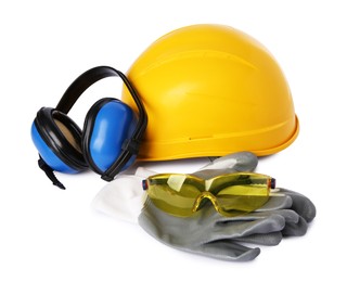 Yellow hard hat, earmuffs, gloves and goggles isolated on white. Safety equipment