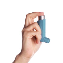 Woman holding asthma inhaler on white background, closeup