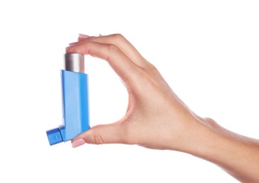 Woman holding asthma inhaler on white background, closeup