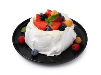 Photo of Pavlova cake (meringue dessert) with whipped cream, fresh berries and mint isolated on white