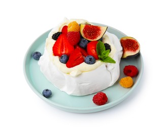 Photo of Pavlova cake (meringue dessert) with whipped cream, fresh berries, mint and fig isolated on white