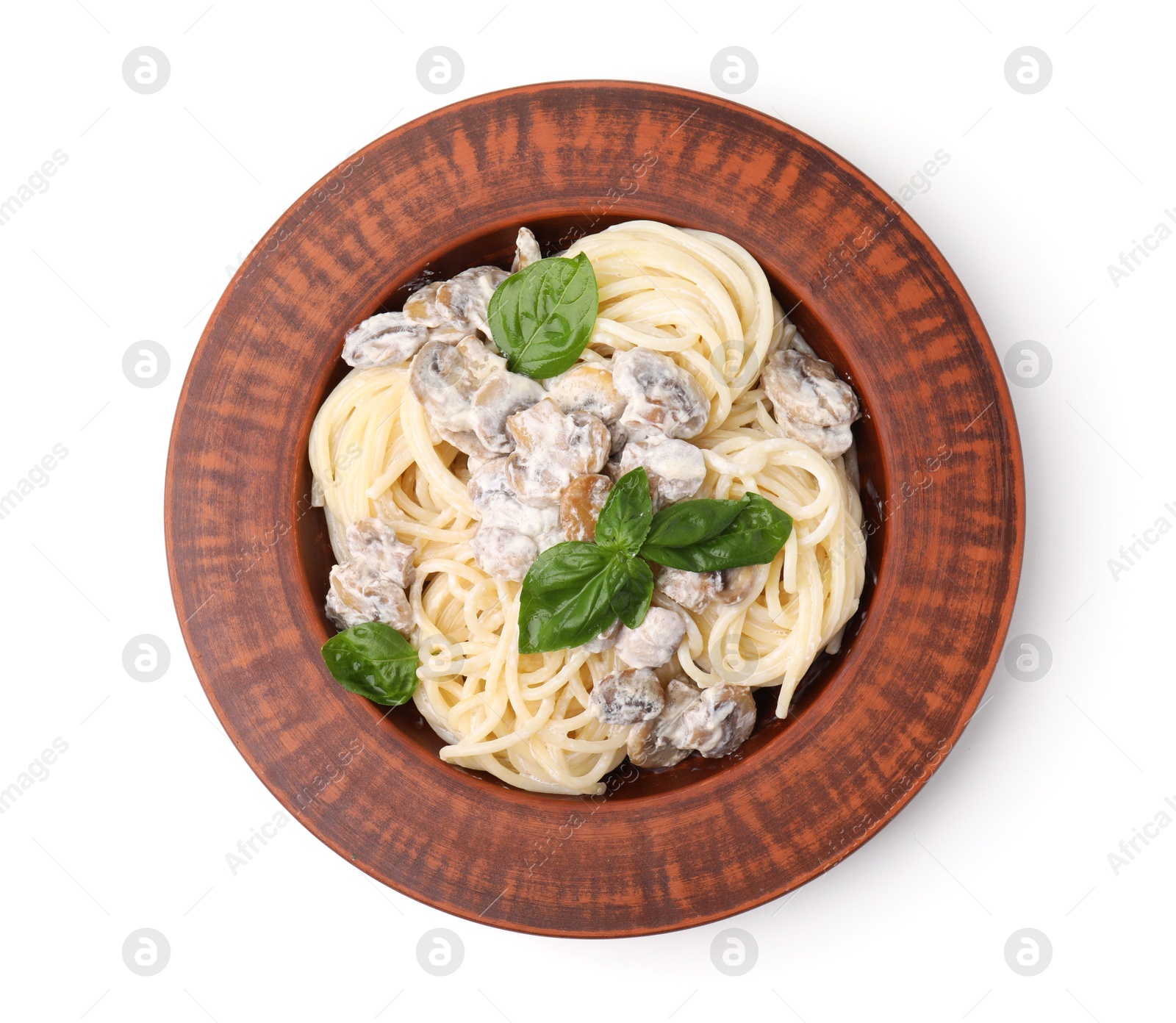 Photo of Delicious pasta with mushrooms and basil isolated on white, top view