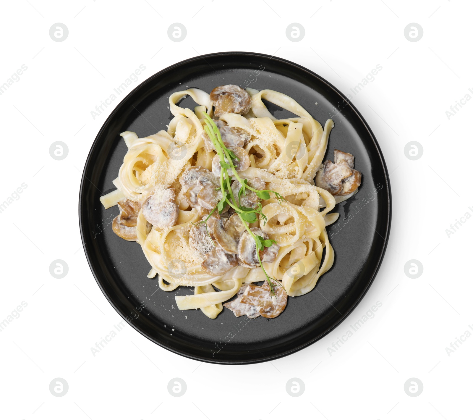 Photo of Delicious pasta with mushrooms isolated on white, top view