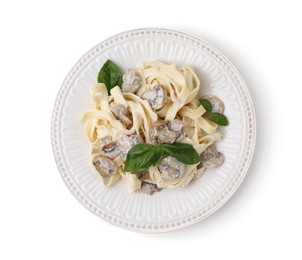 Photo of Delicious pasta with mushrooms and basil isolated on white, top view