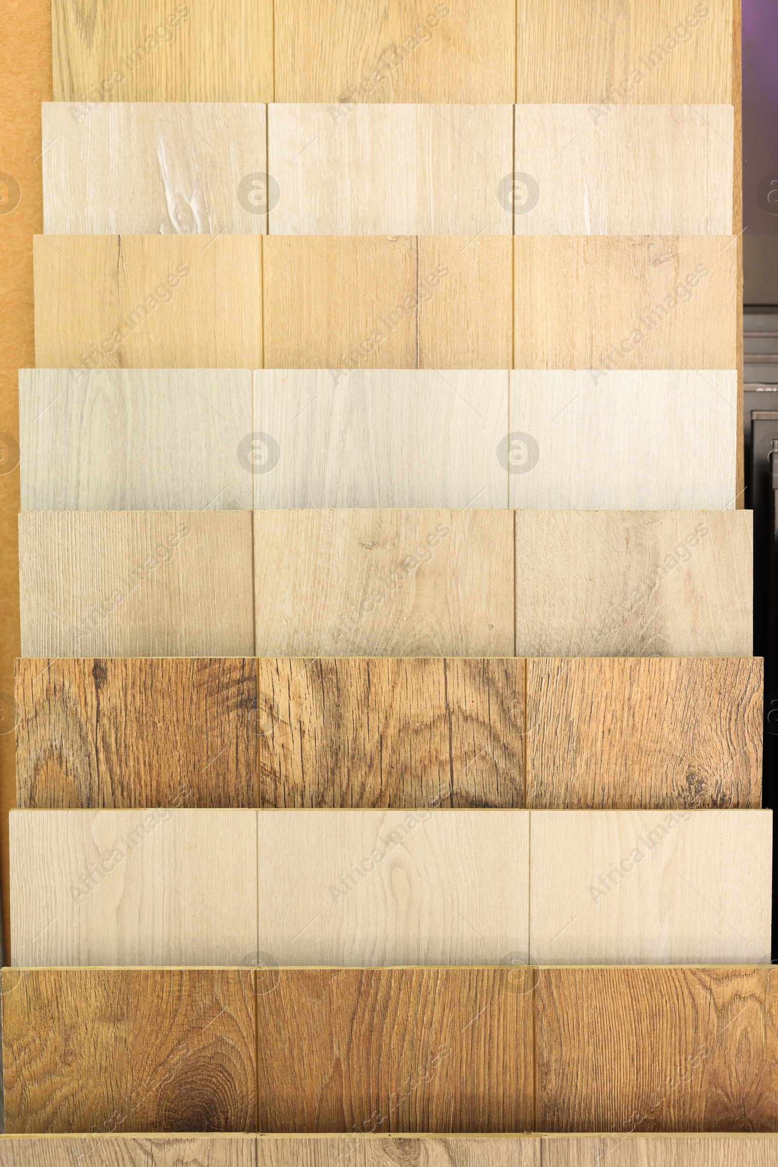 Photo of Many different samples of wooden flooring in store