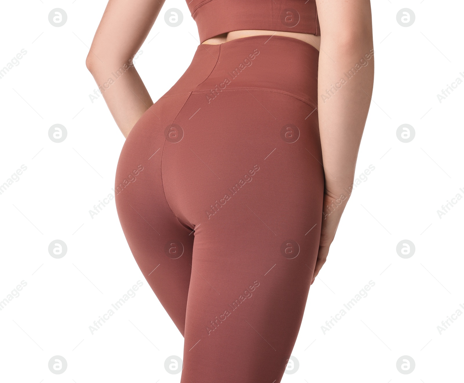 Photo of Woman wearing sports leggings on white background, closeup