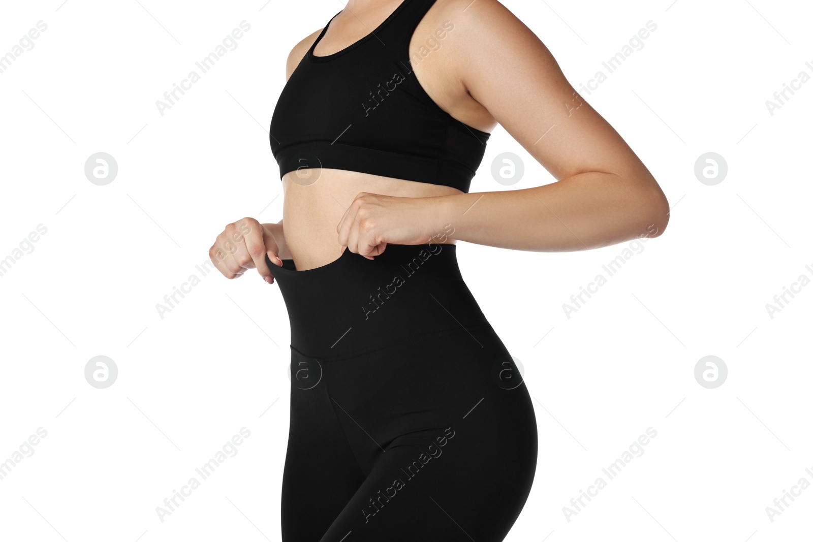 Photo of Woman wearing black sports leggings on white background, closeup