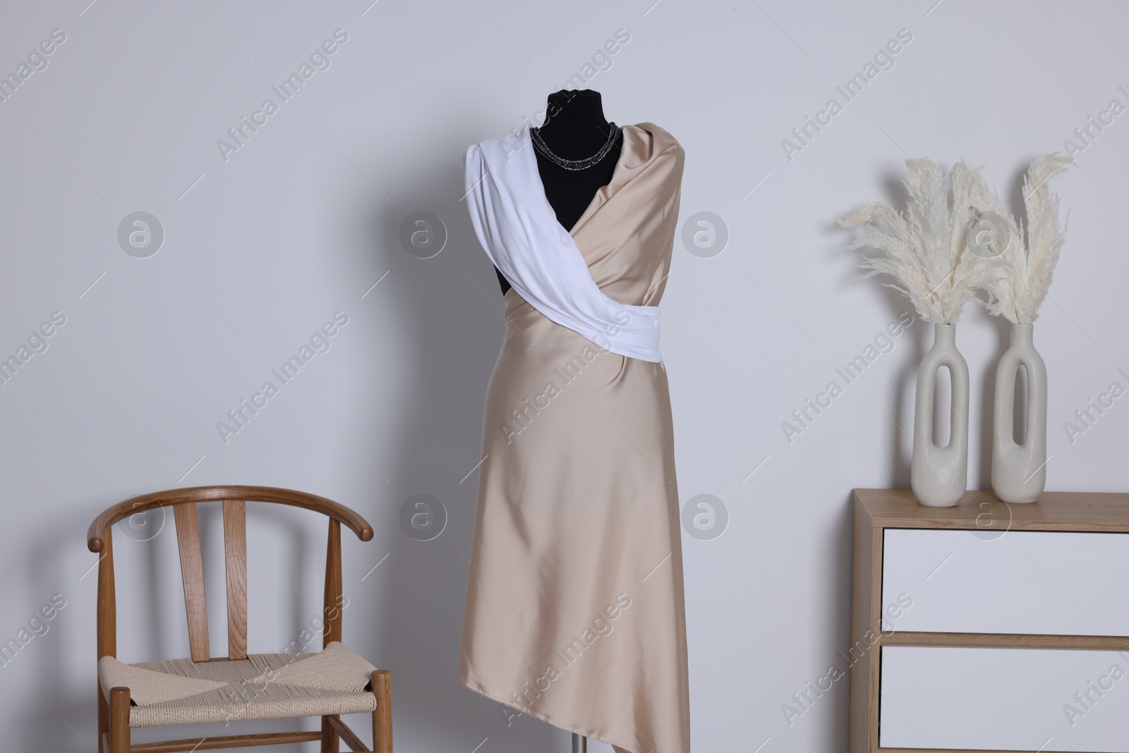 Photo of Female mannequin with draping in designer's workshop