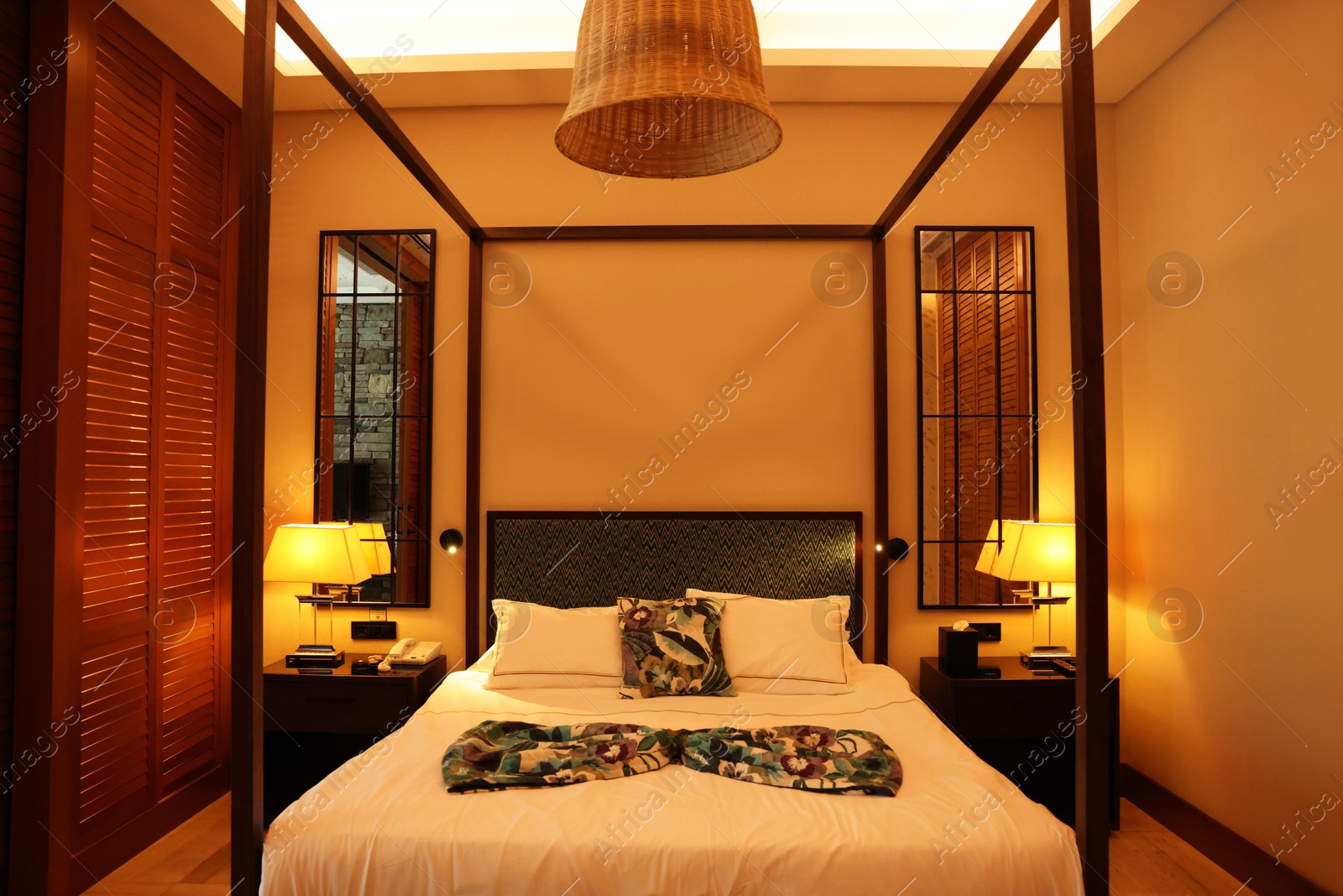 Photo of Comfortable large bed in stylish hotel room