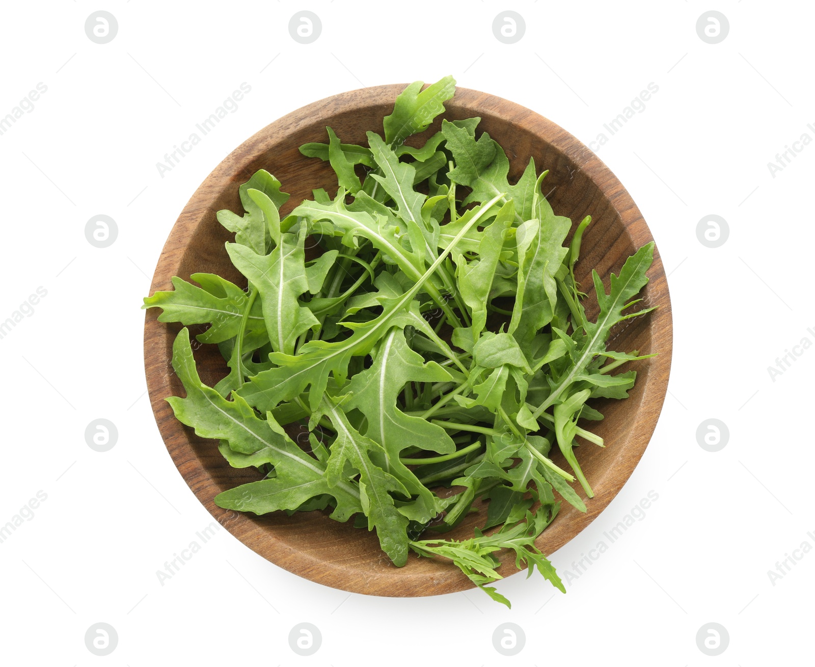 Photo of Fresh arugula leaves in bowl isolated on white, top view