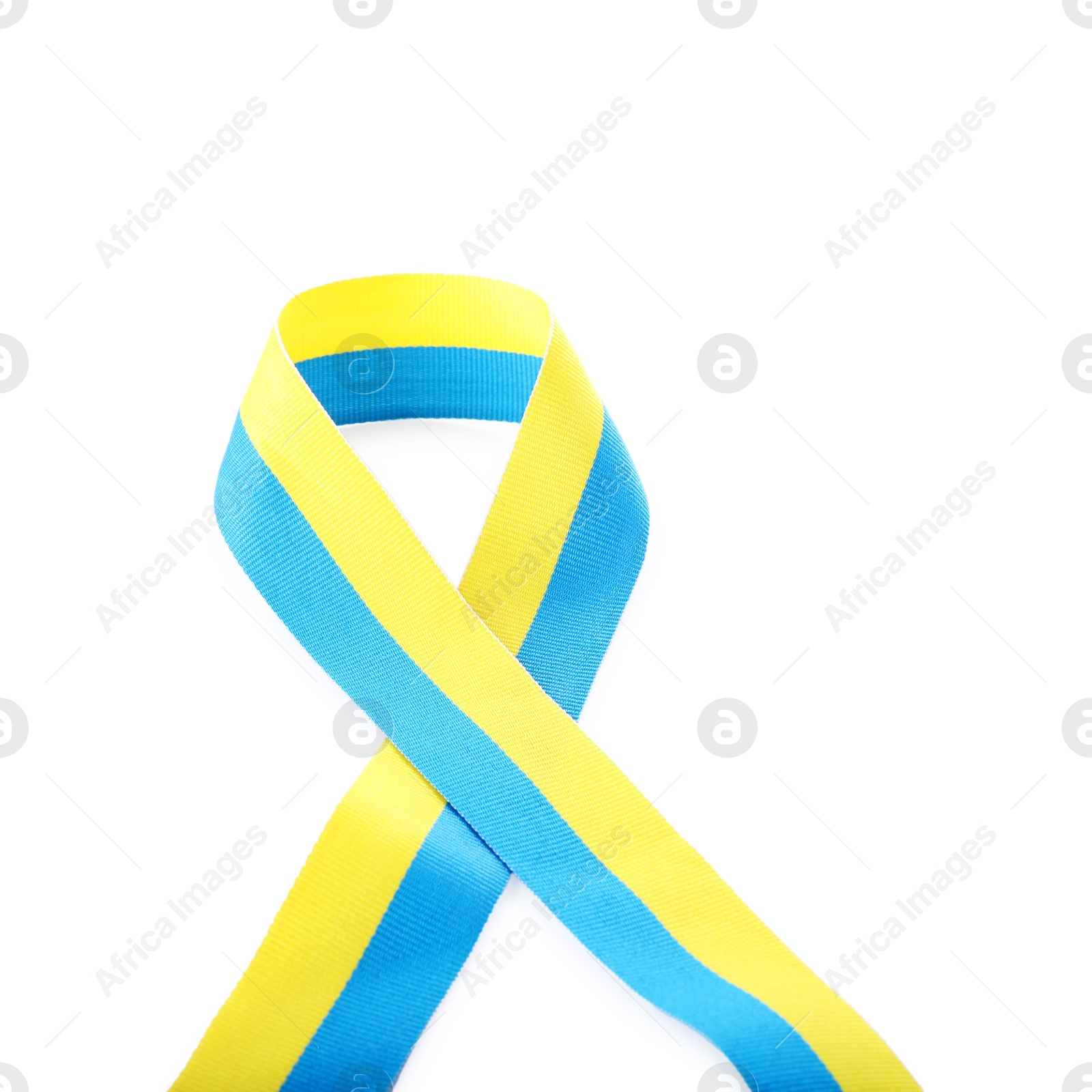 Photo of Ribbon in colors of Ukrainian national flag isolated on white