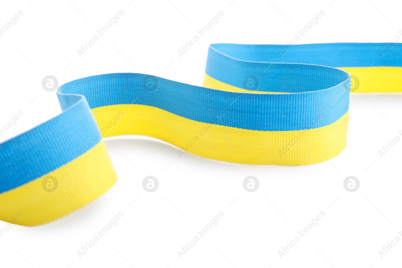 Photo of Ribbon in colors of Ukrainian national flag isolated on white