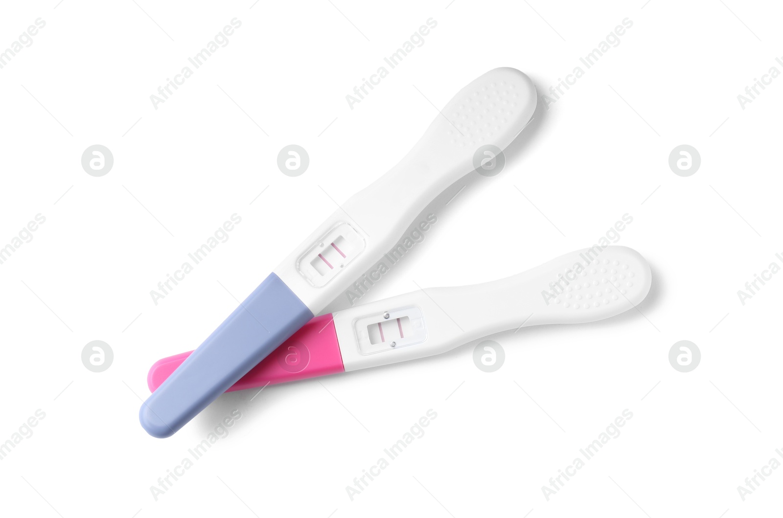 Photo of Pregnancy tests isolated on white, top view