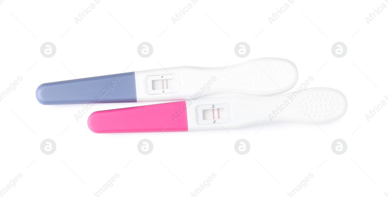 Photo of Pregnancy tests isolated on white, top view