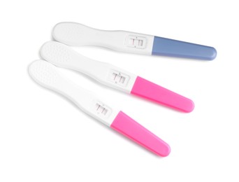 Photo of Pregnancy tests isolated on white, above view