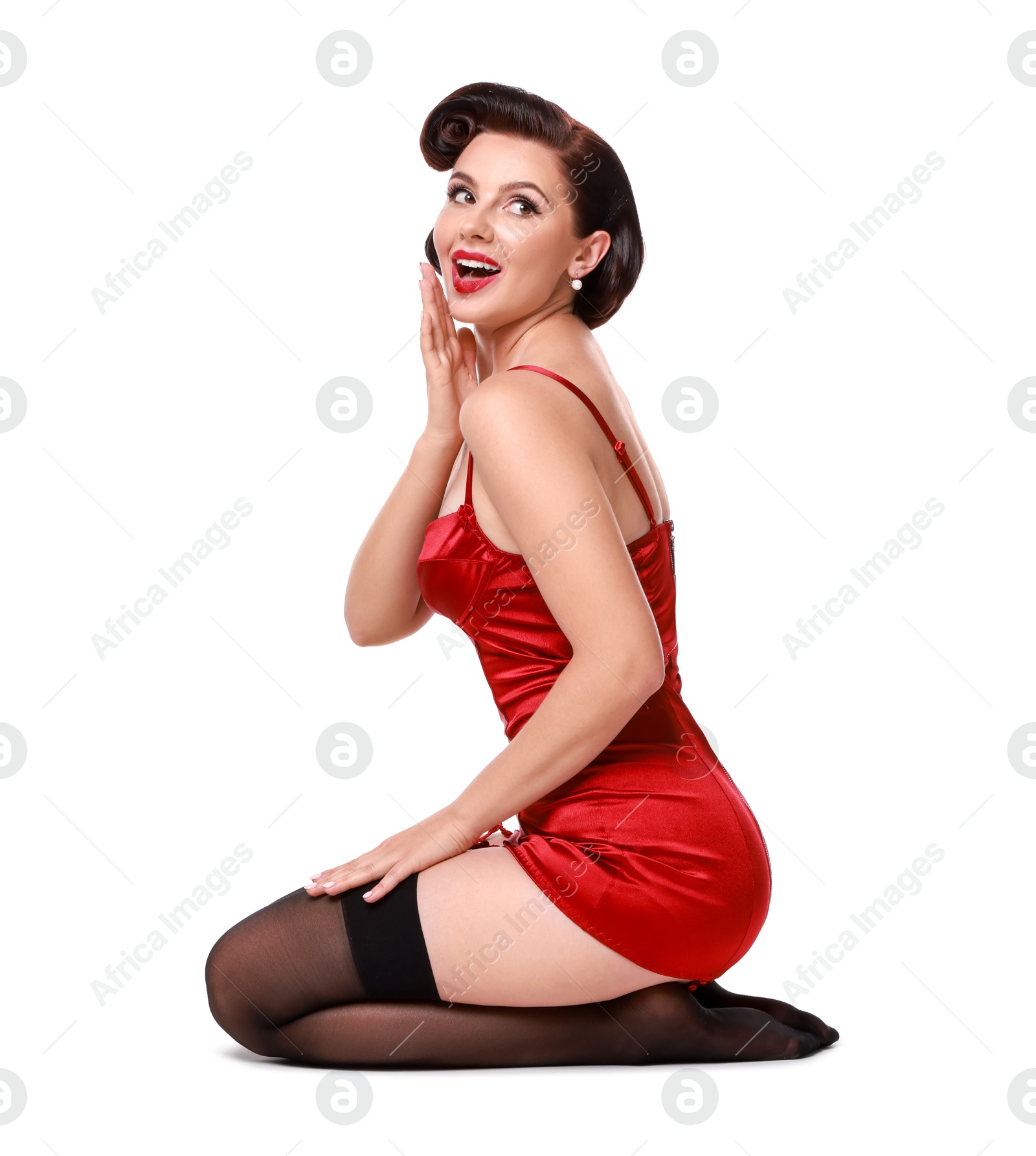 Photo of Pin-up woman in red underwear on white background