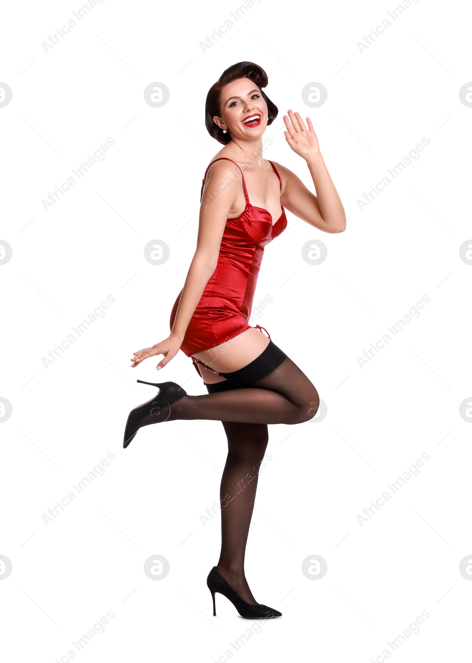 Photo of Pin-up woman in red underwear on white background