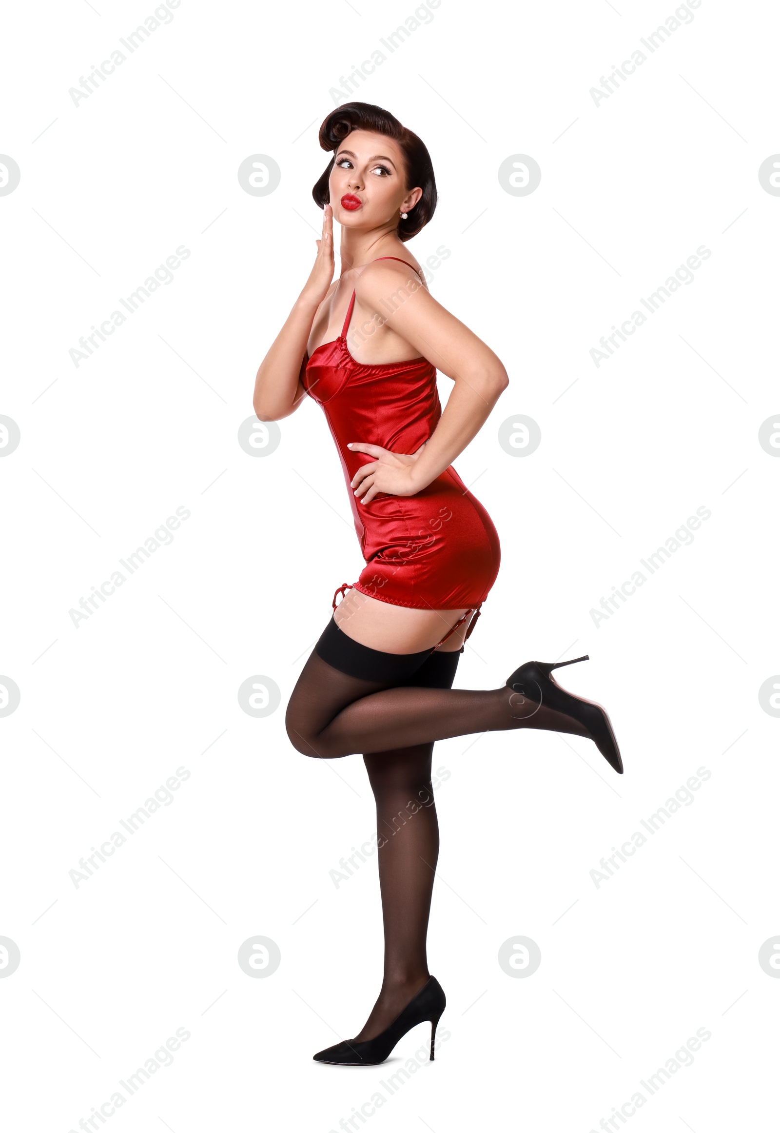 Photo of Pin-up woman in red underwear on white background