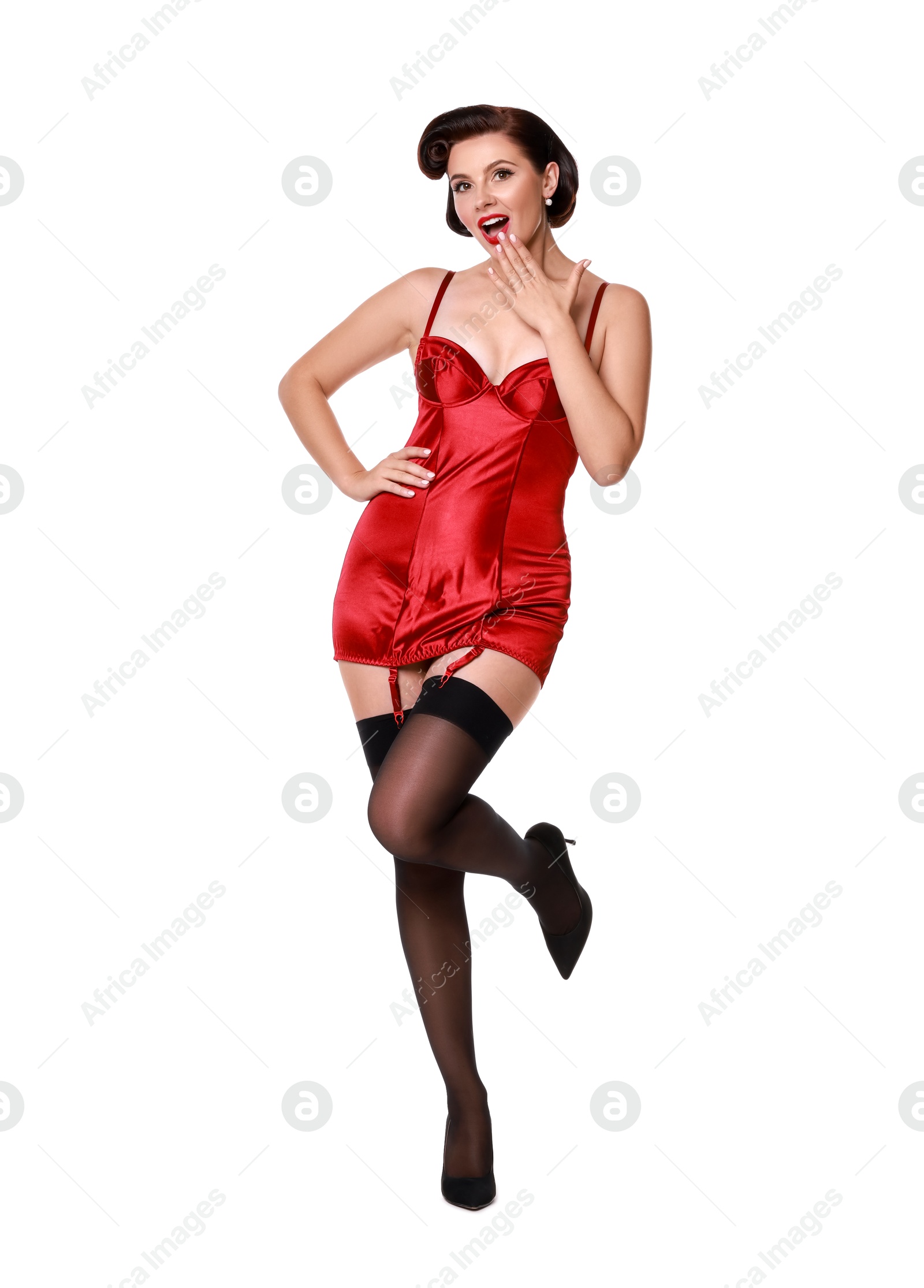 Photo of Pin-up woman in red underwear on white background