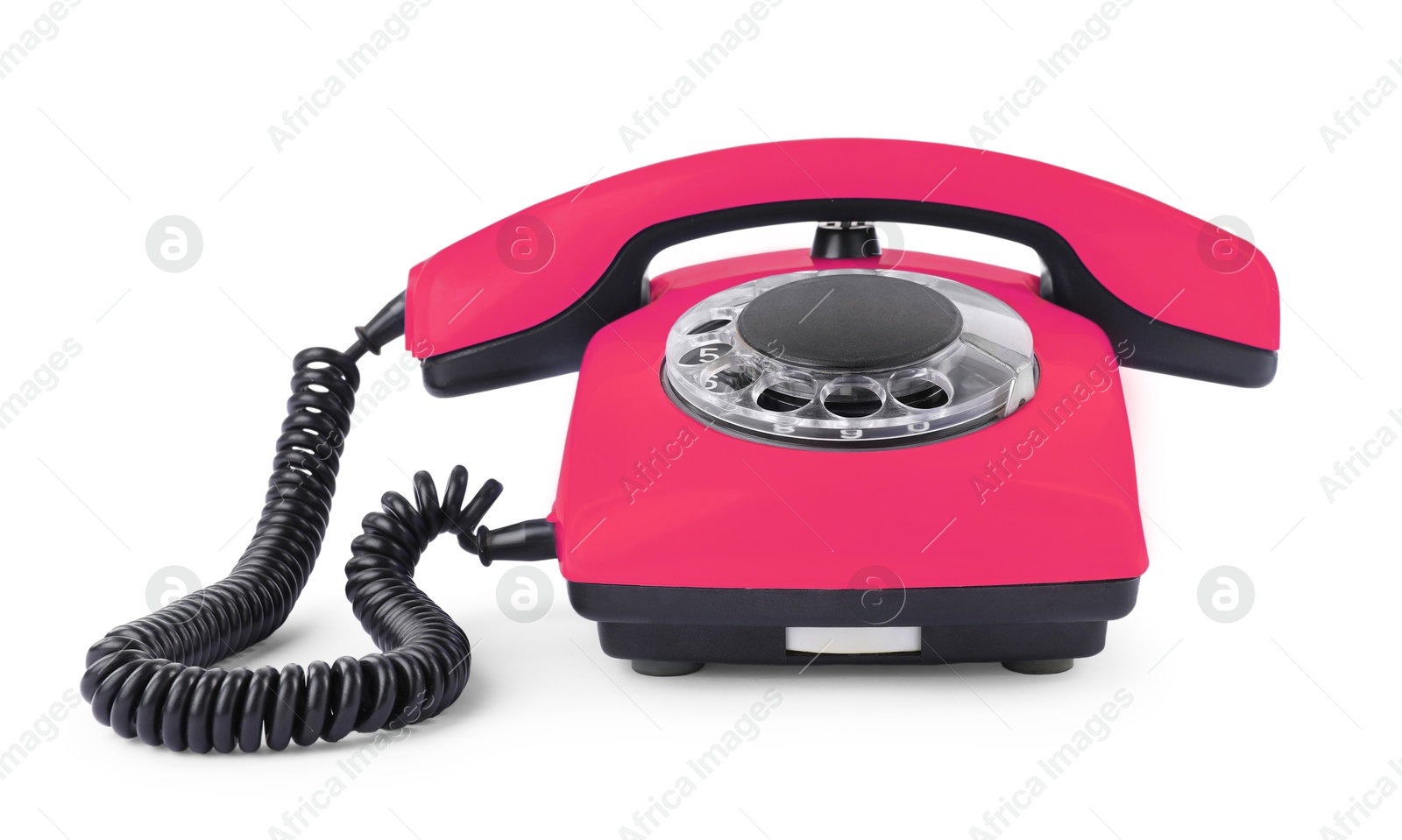 Image of Old pink telephone with rotary dial isolated on white