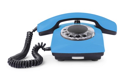 Image of Old light blue telephone with rotary dial isolated on white