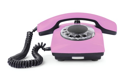 Image of Old pink telephone with rotary dial isolated on white