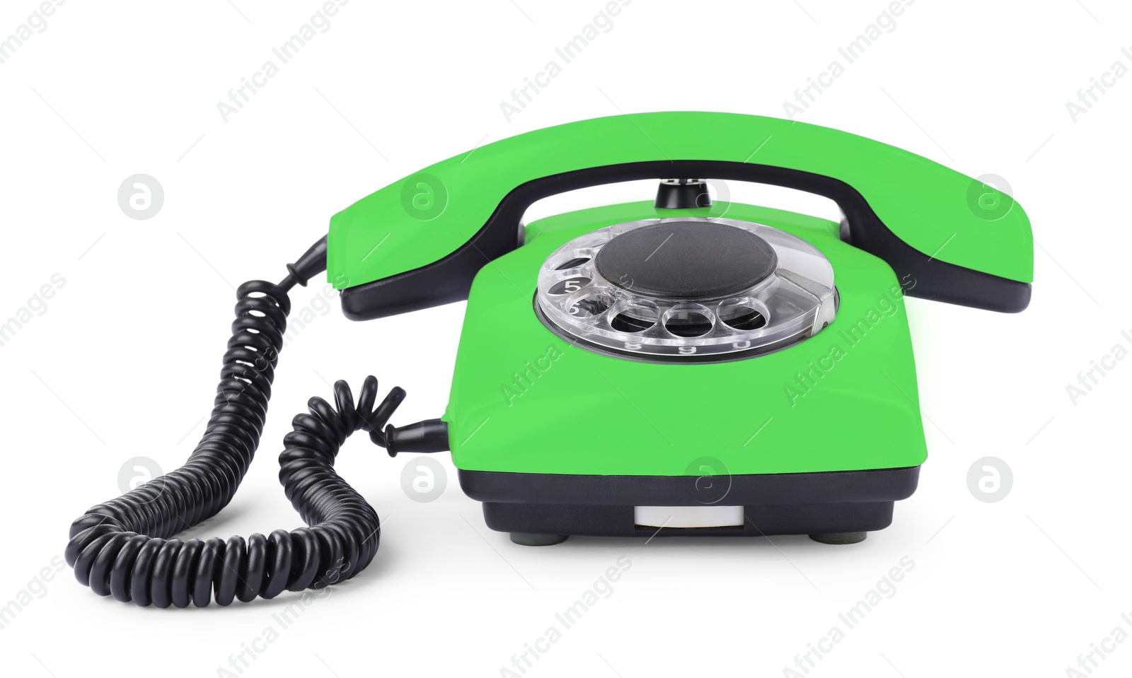 Image of Old light green telephone with rotary dial isolated on white