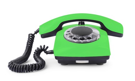 Image of Old light green telephone with rotary dial isolated on white