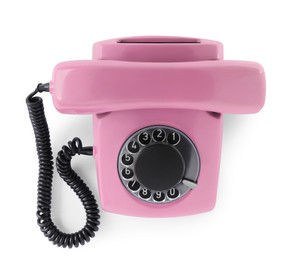 Image of Old pink telephone with rotary dial isolated on white, top view