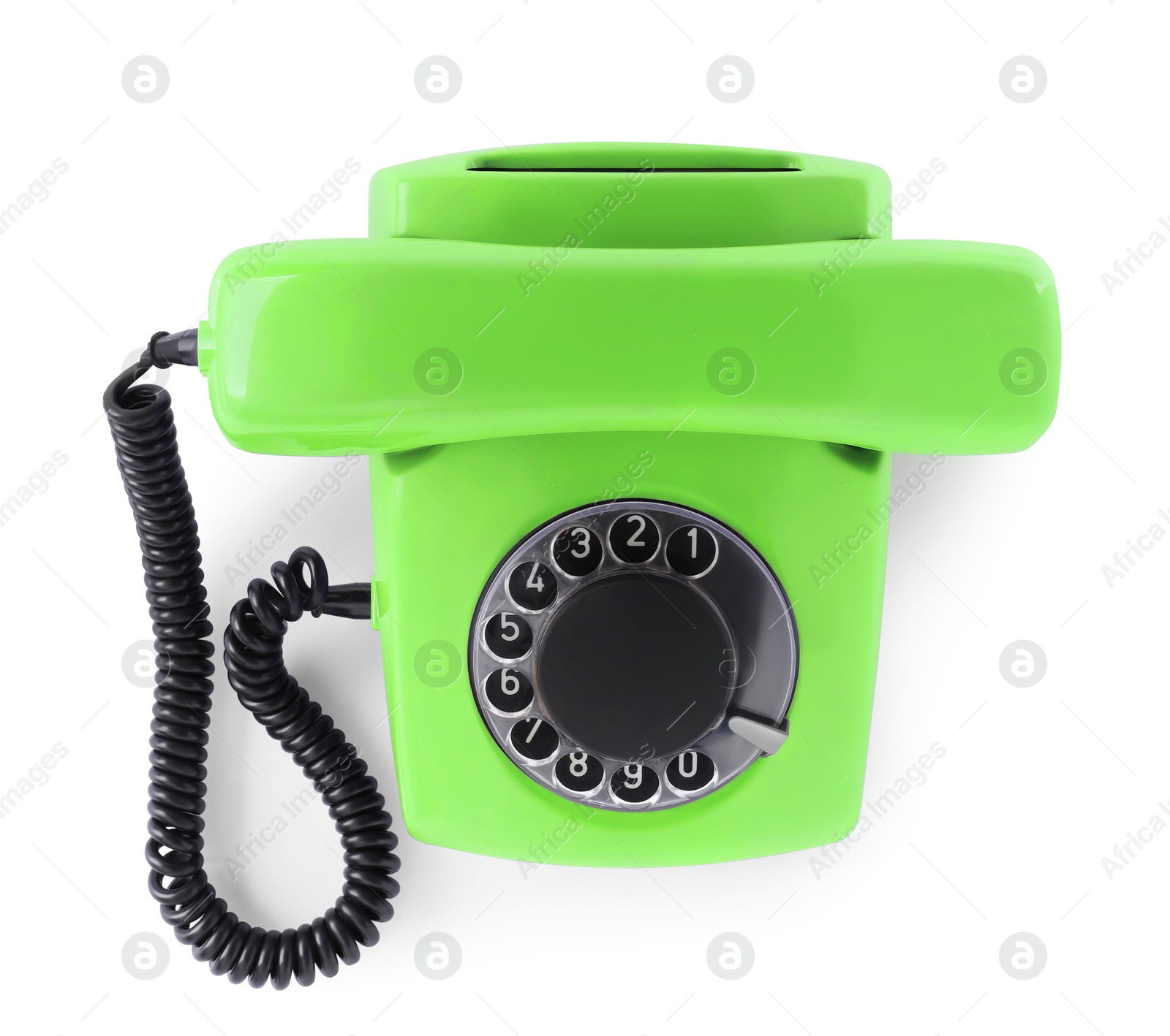 Image of Old light green telephone with rotary dial isolated on white, top view