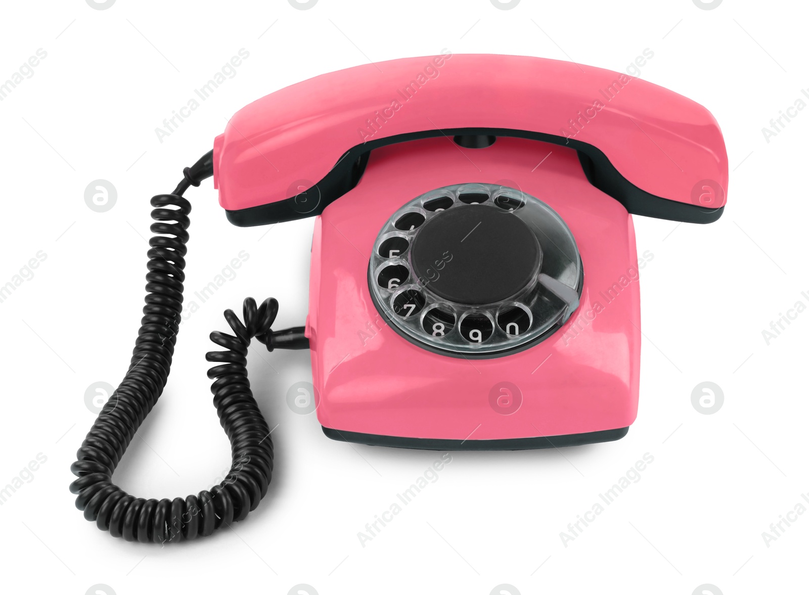 Image of Old salmon color telephone with rotary dial isolated on white