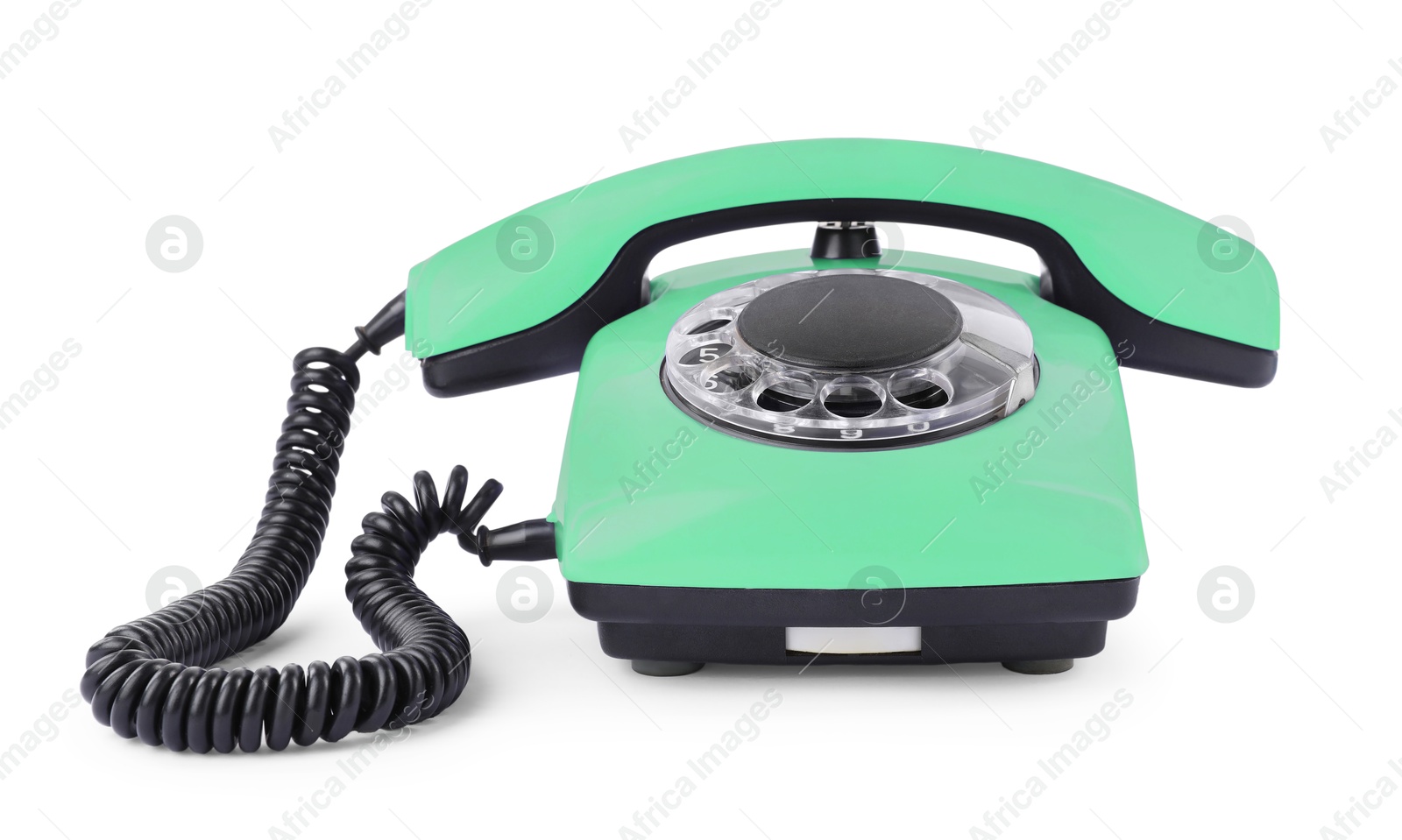 Image of Old aquamarine telephone with rotary dial isolated on white