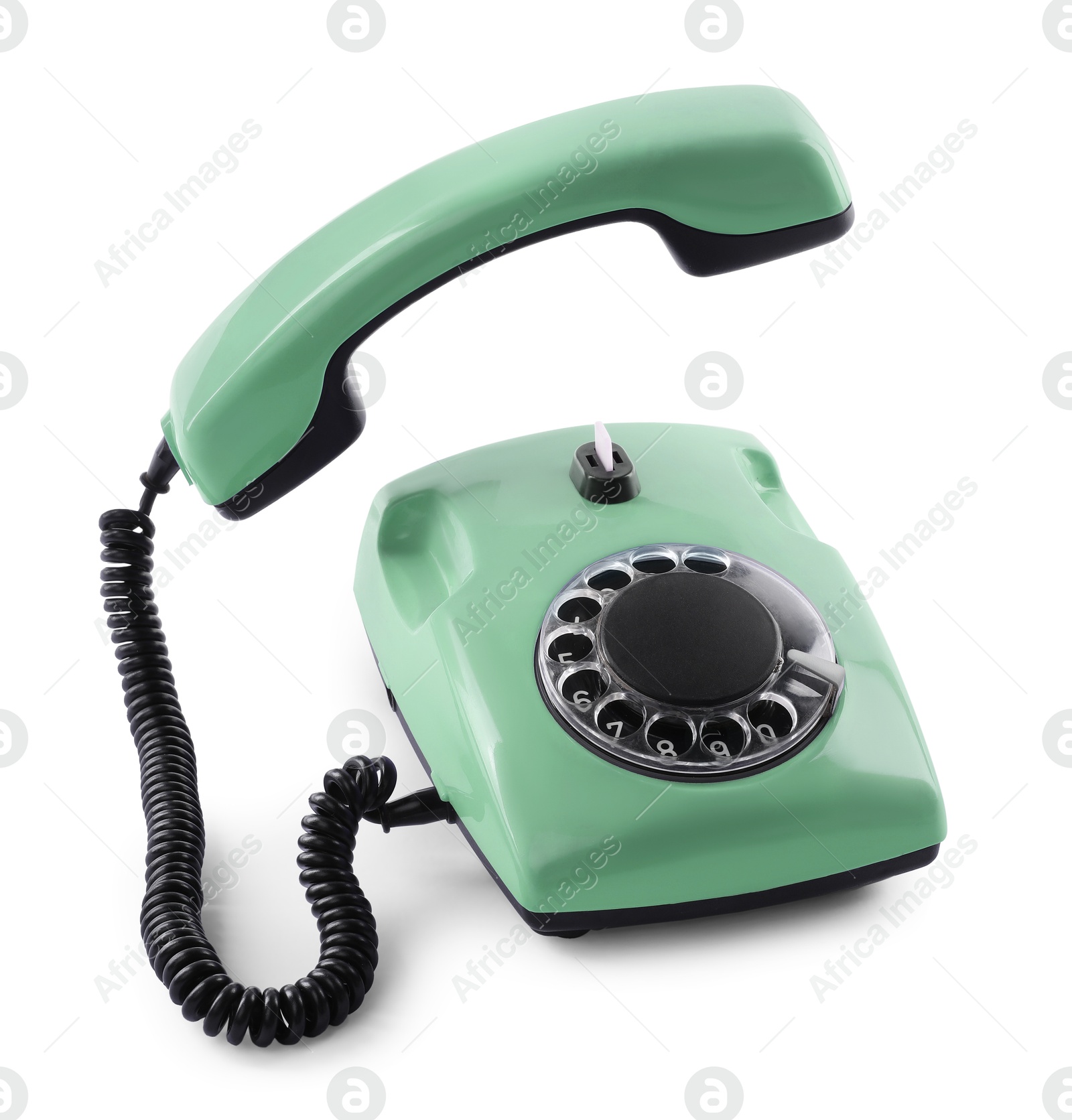 Image of Old aquamarine telephone with rotary dial isolated on white