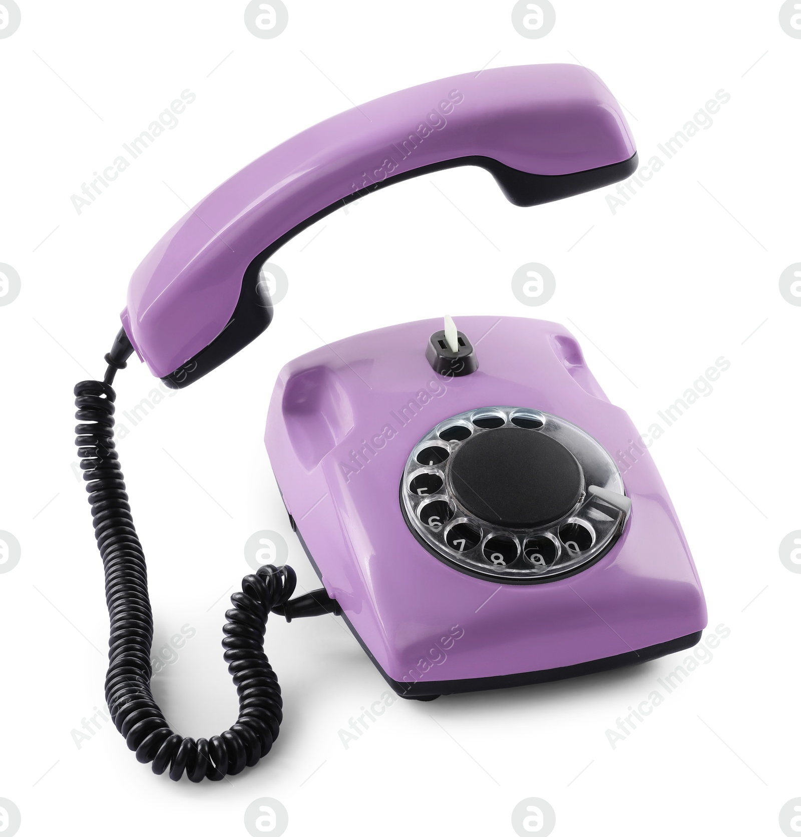 Image of Old violet telephone with rotary dial isolated on white