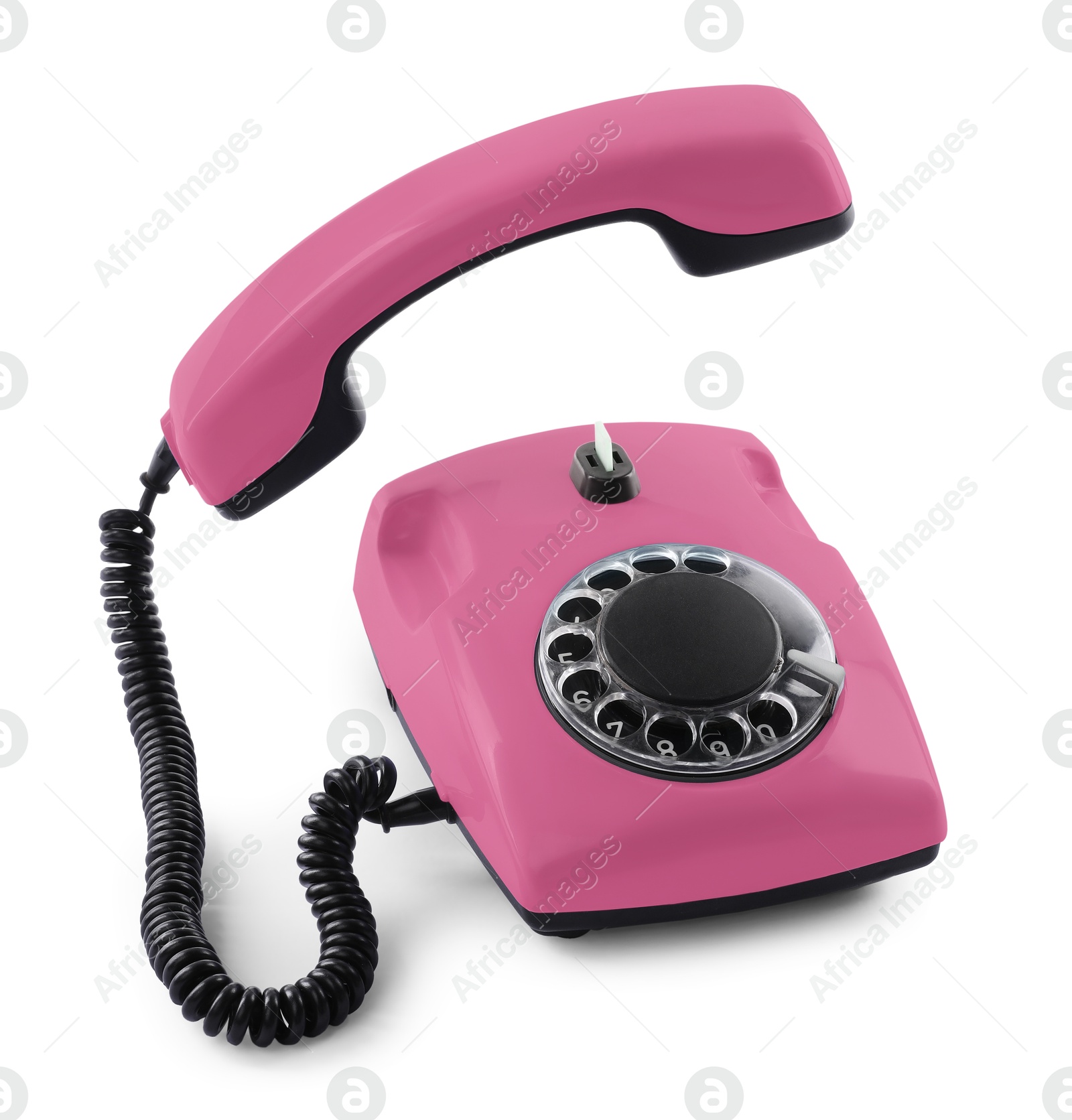 Image of Old pink telephone with rotary dial isolated on white