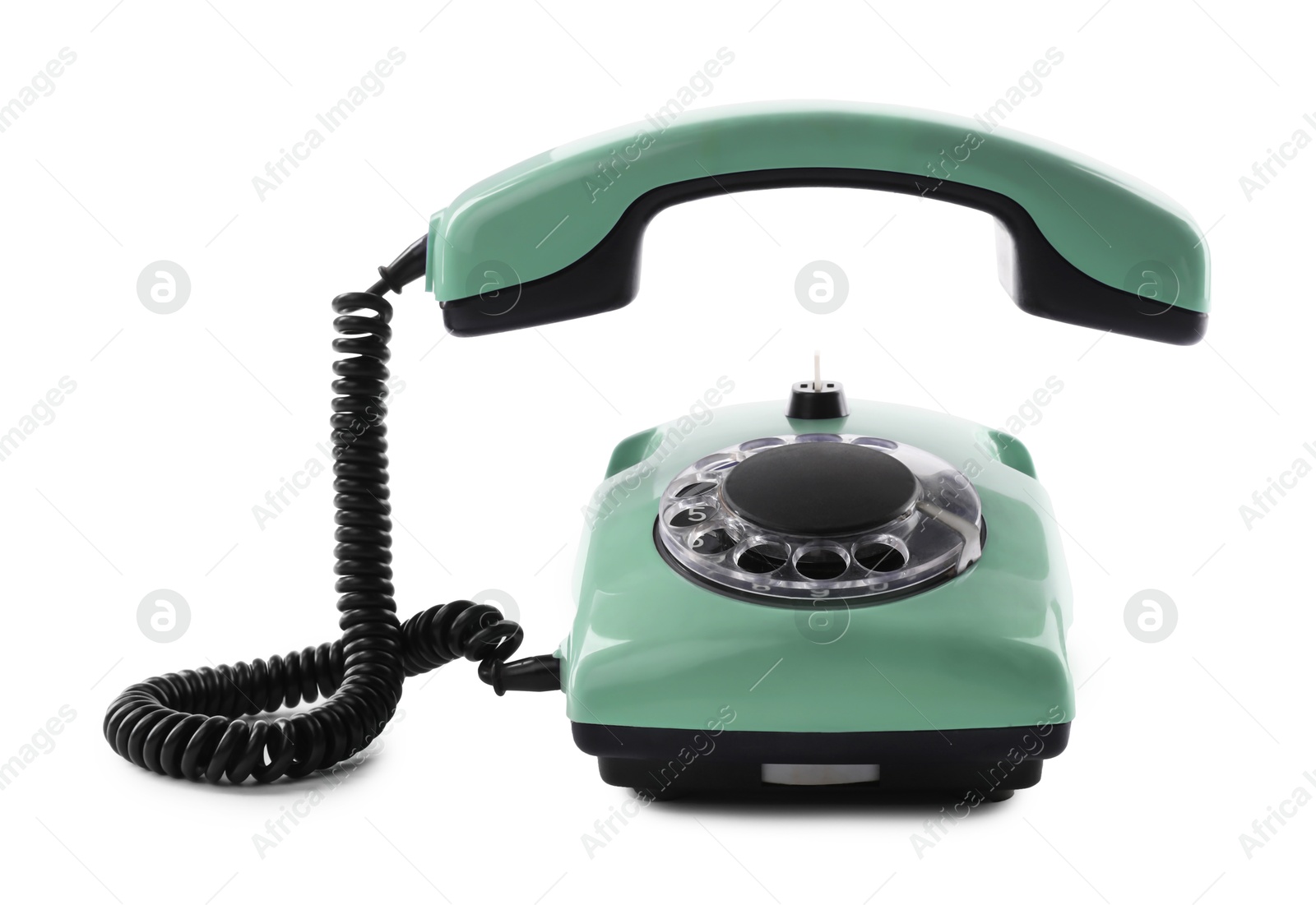 Image of Old aquamarine telephone with rotary dial isolated on white