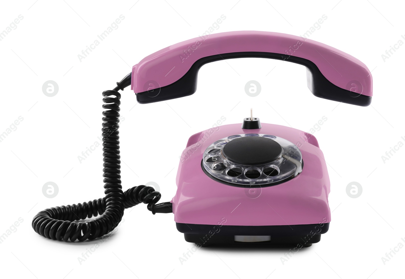 Image of Old pink telephone with rotary dial isolated on white