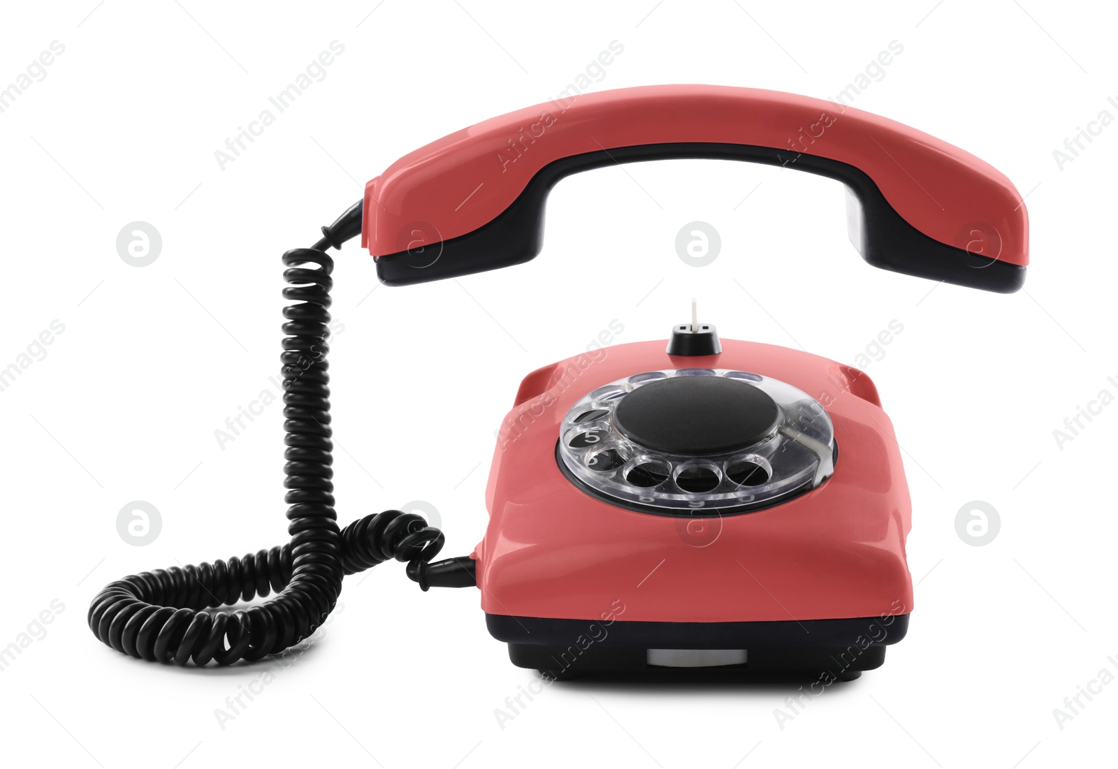 Image of Old red telephone with rotary dial isolated on white