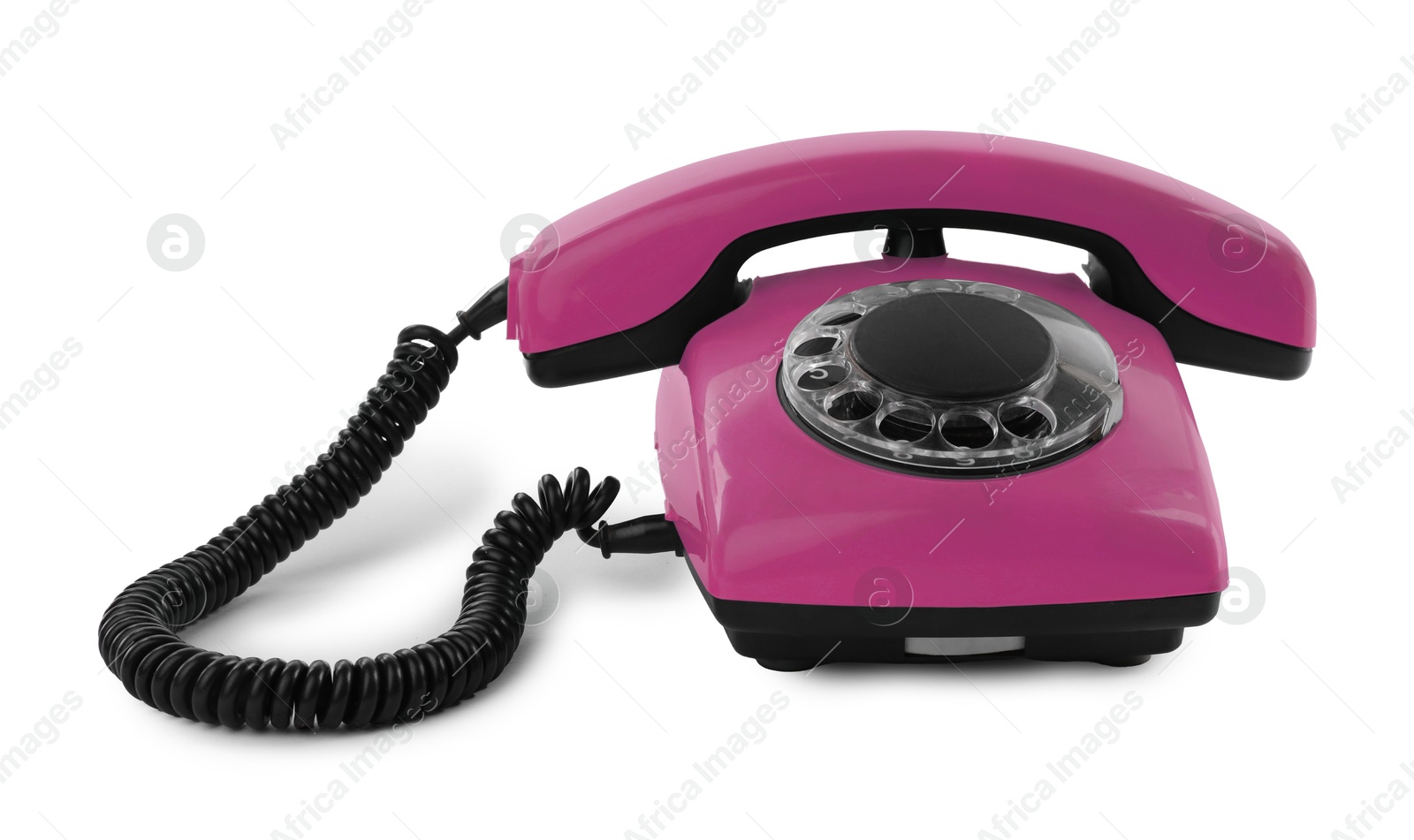 Image of Old pink telephone with rotary dial isolated on white