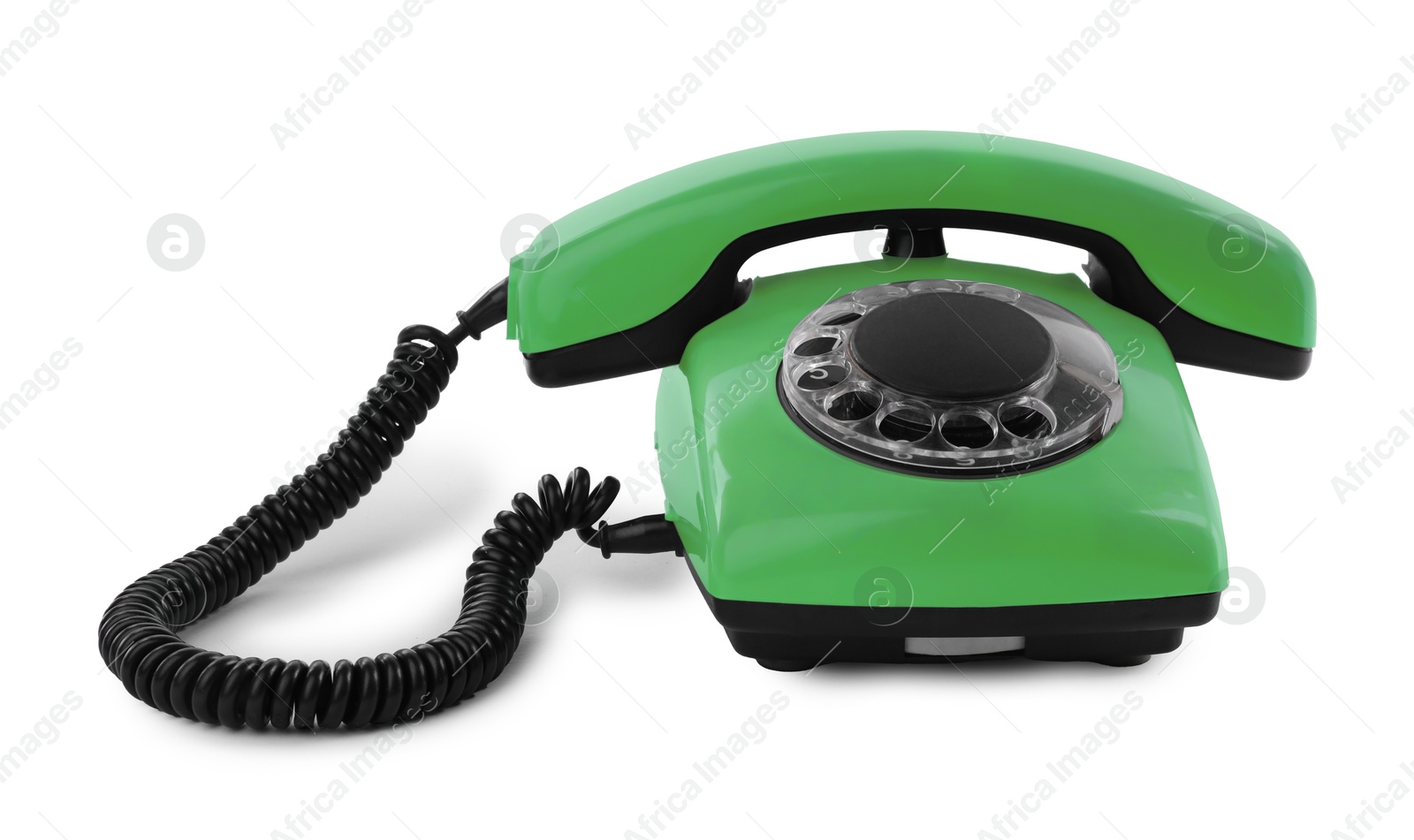 Image of Old light green telephone with rotary dial isolated on white